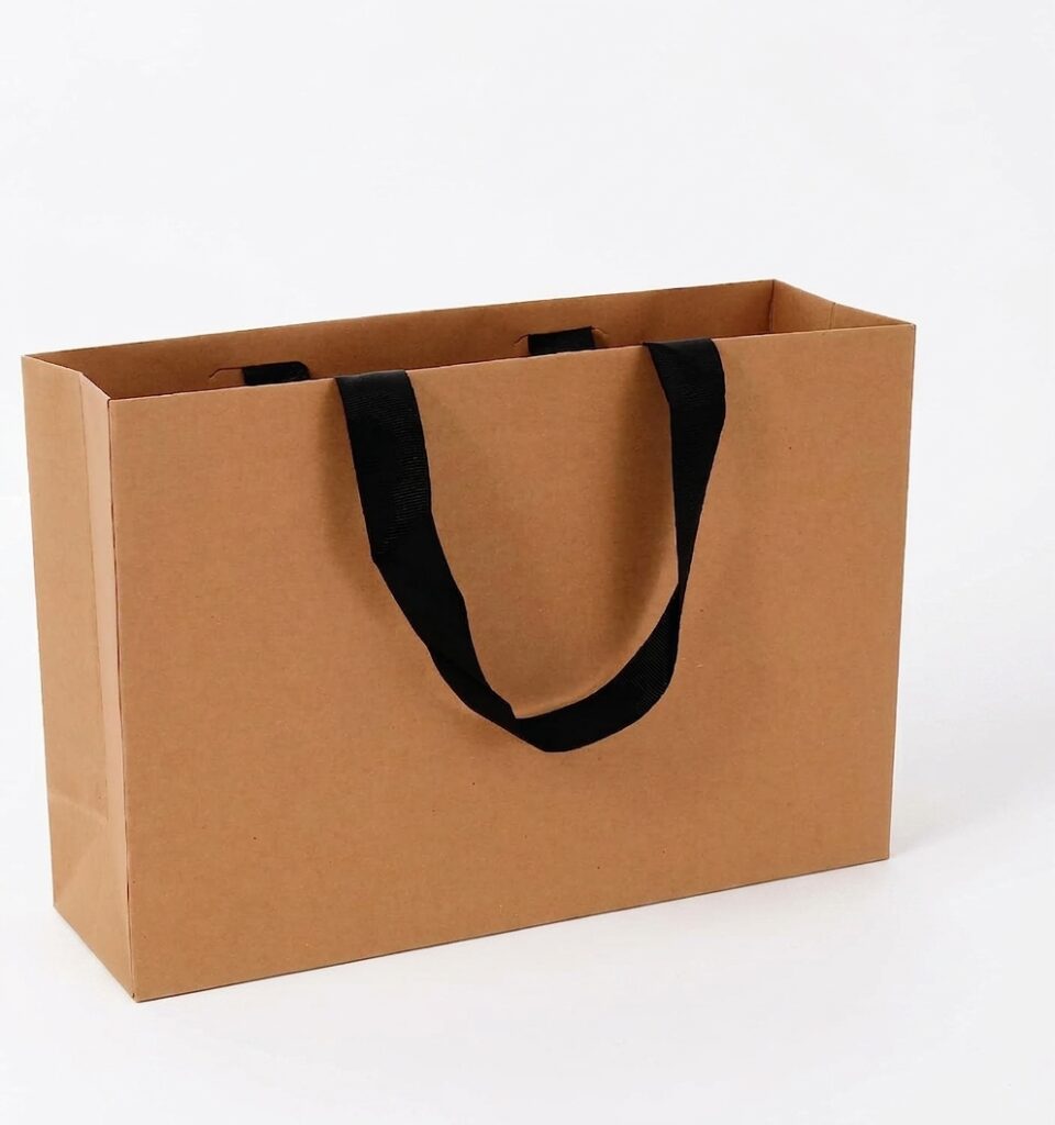 Premium matte gift bags with grosgrain ribbon handles