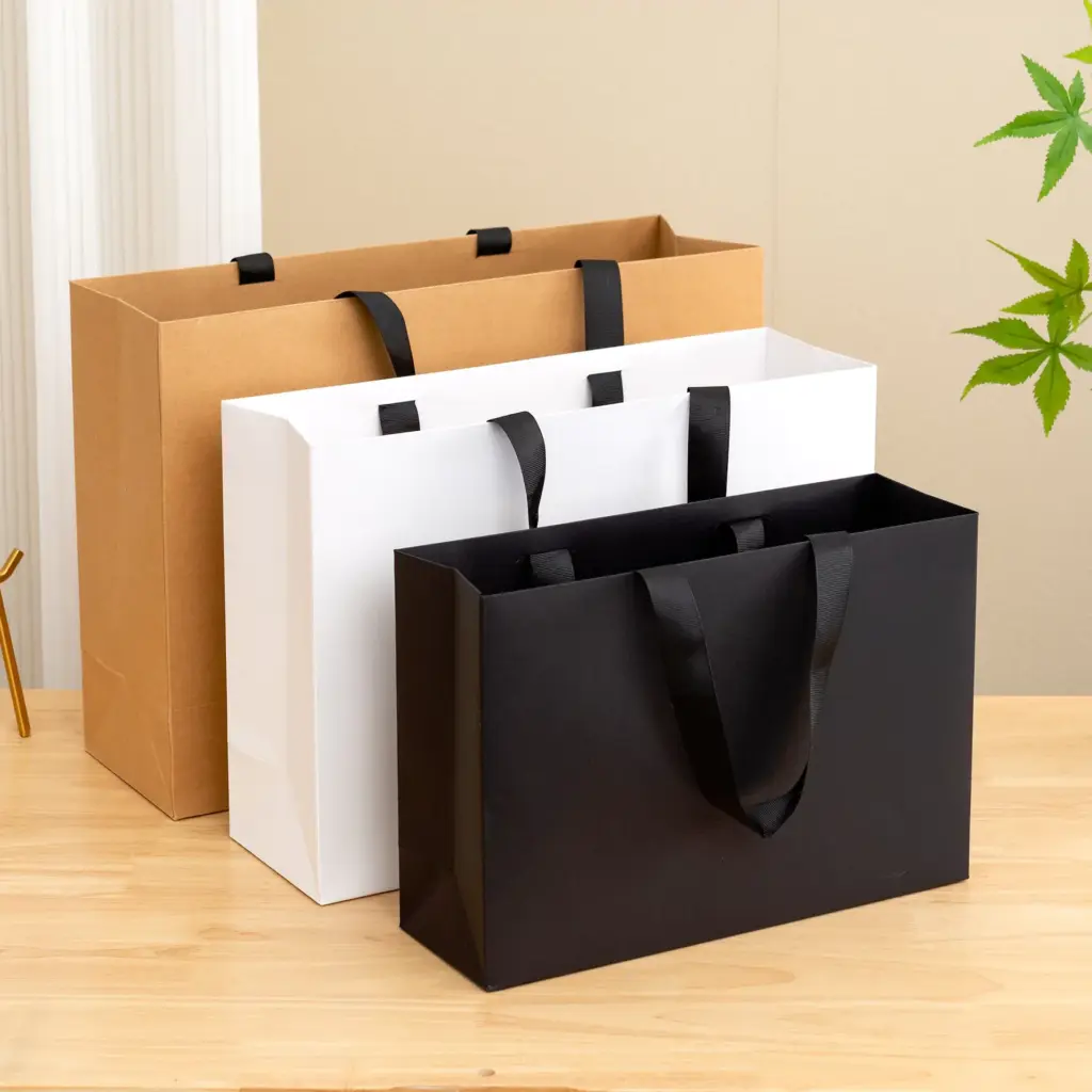 Premium matte gift bags with grosgrain ribbon handles