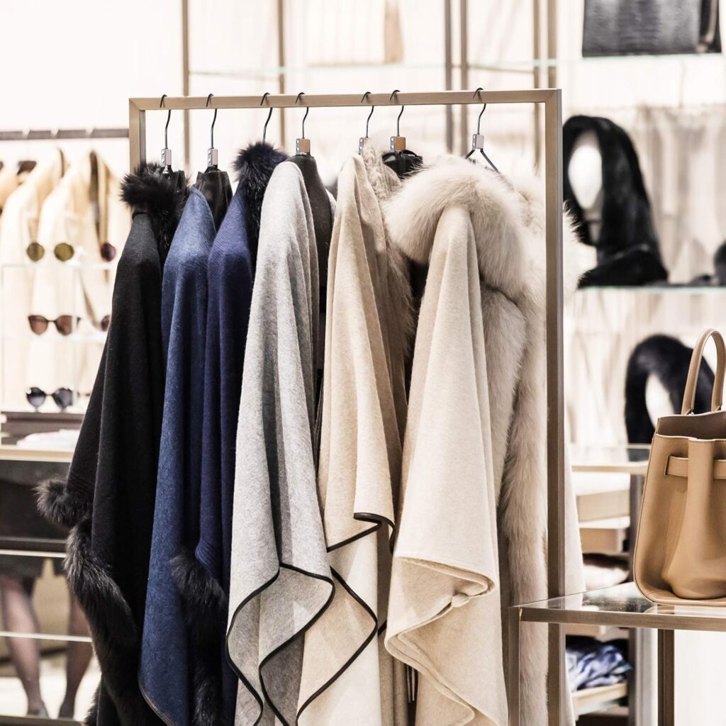 slim metal clothes hanger with accessory hooks