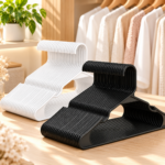 Plastic hangers 100 pack in white and black with notched shoulders